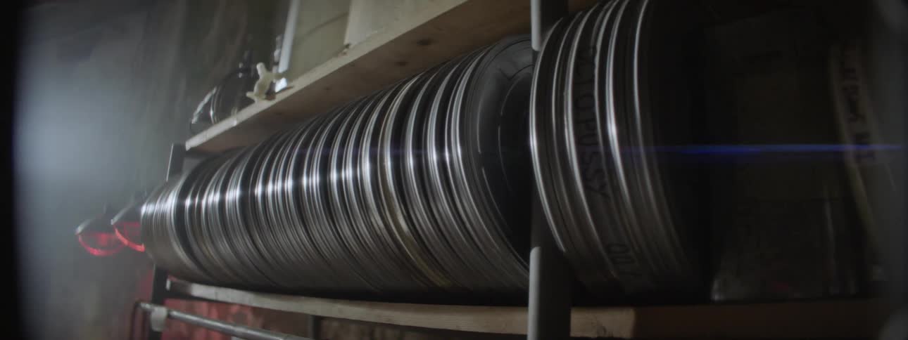 The shelves are lined with reels of film