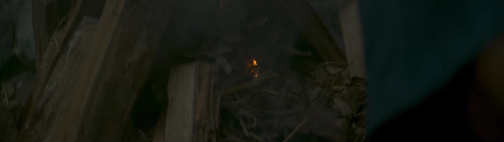 A fire begins to burn outside