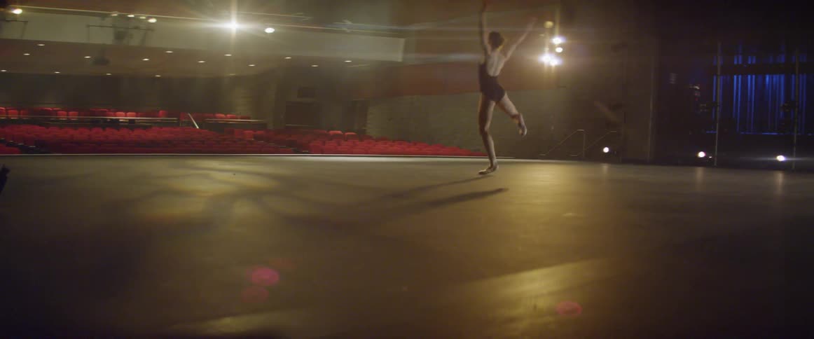 A ballerina is dancing on the stage