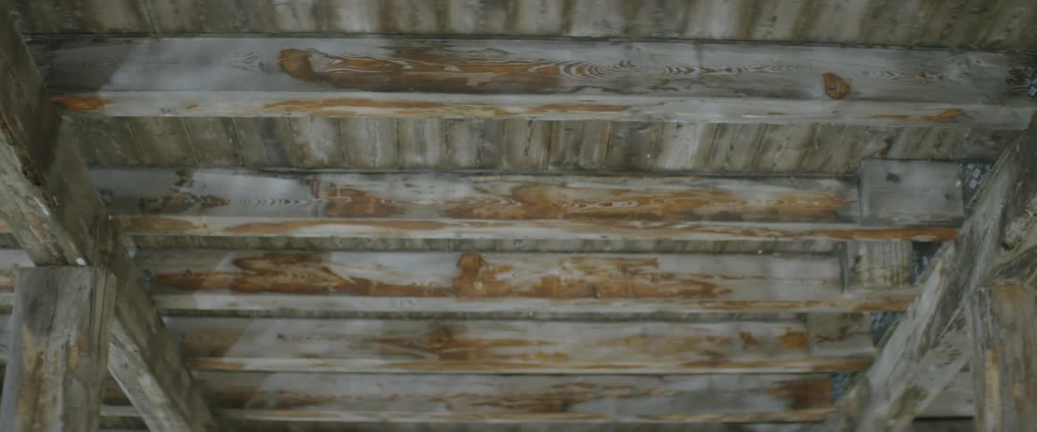 Wooden steps with shadows over them