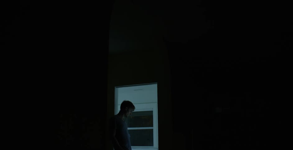A person standing in front of a door