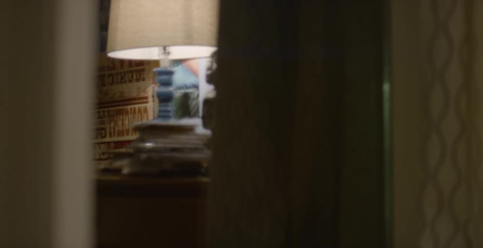 A lamp on a nightstand