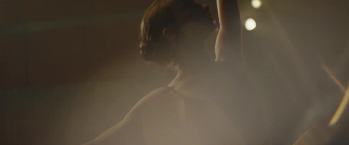 A girl is practicing ballet dancing
