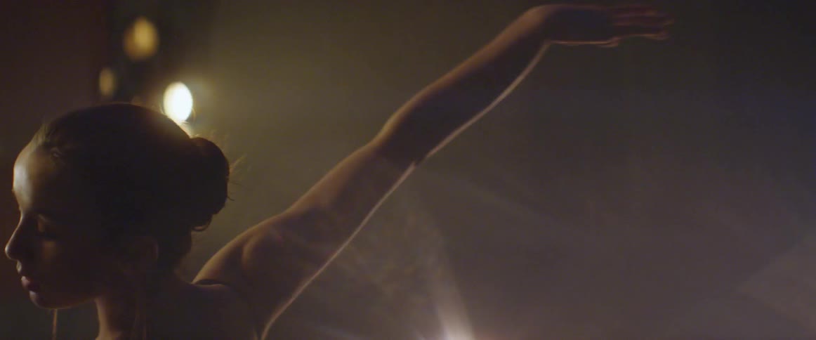 A ballet dancer is dancing