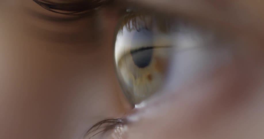 A person blinks their eye