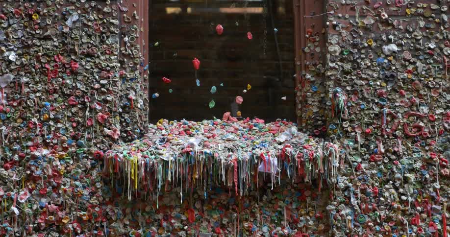 Chewed gum covers a building and windowsill