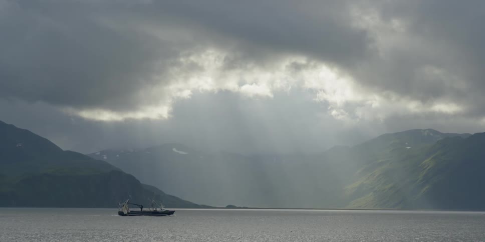 A ship is traversing the sea
