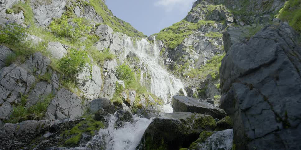 Water flows through a rocky canyon