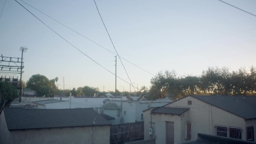 Sun sets near a small town
