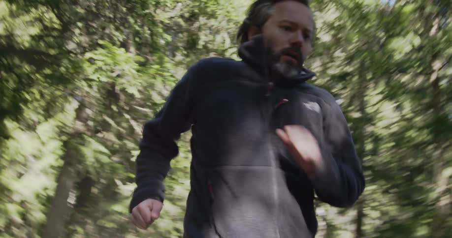 A man running through a forest