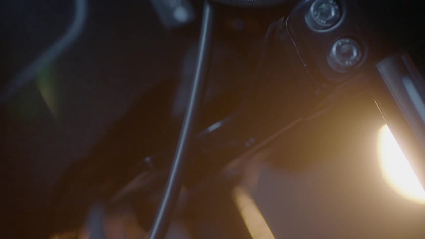 The light is slightly illuminating the wires and engine