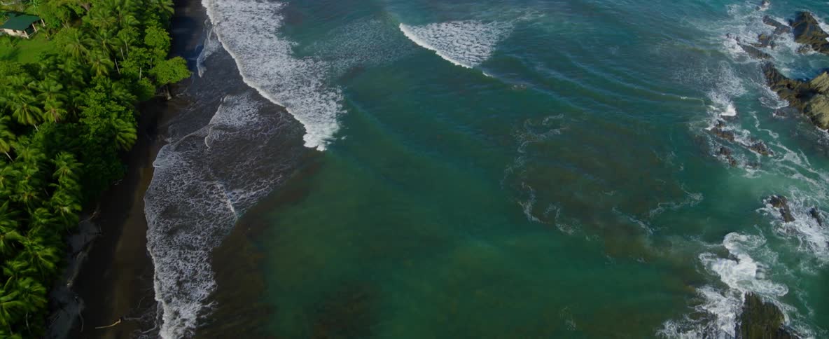 Ocean waves splash to shore