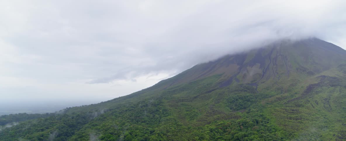 Clouds cover the peak of a mountain