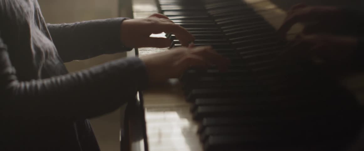 A child plays piano
