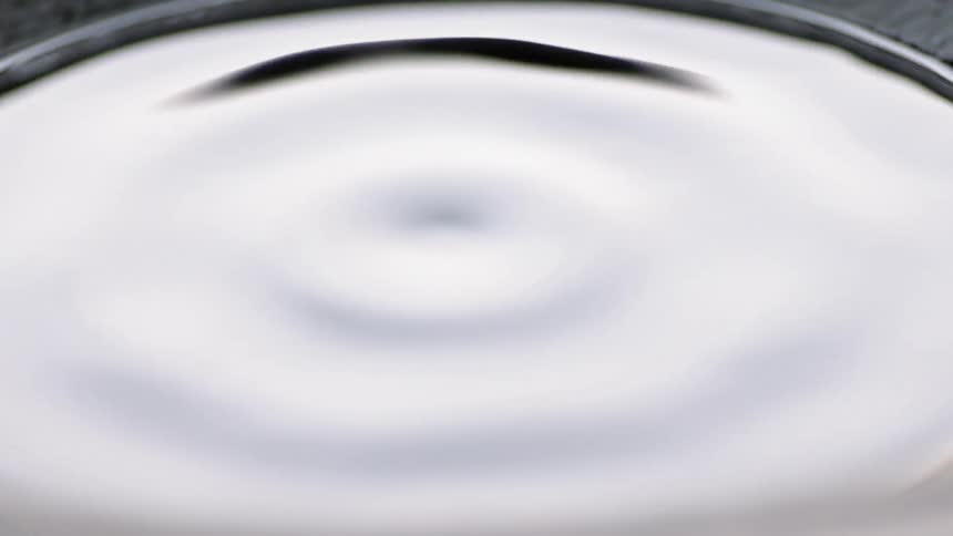 Liquid vibrates in an uneven pattern