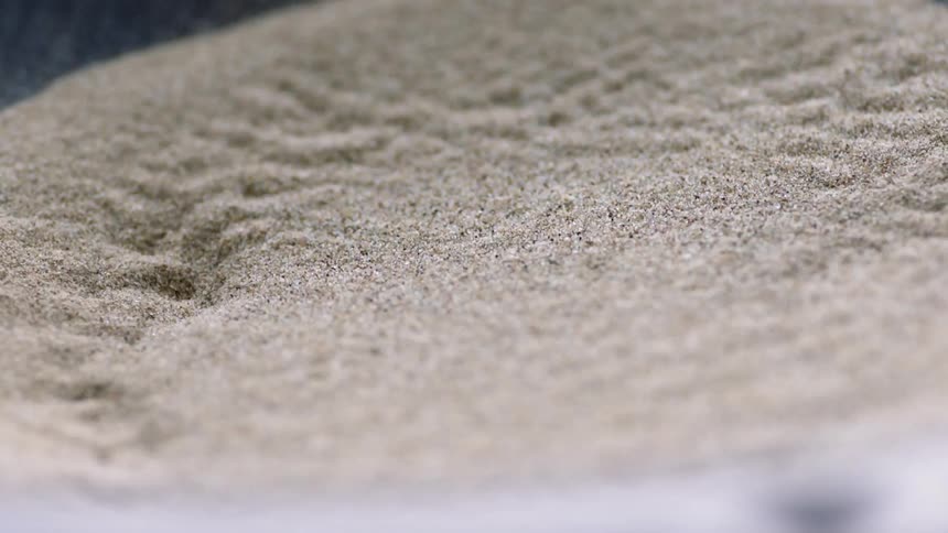 Sand is vibrating on a platform