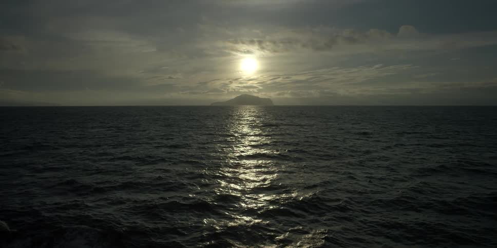 The sun shines down on rippling ocean water