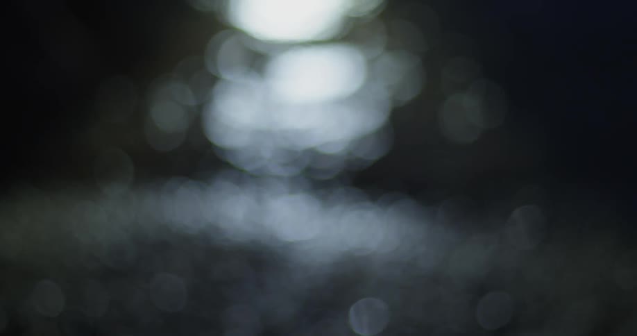 Rippling water with light shining off it
