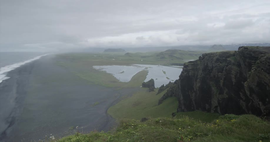 The foggy range leads to the ocean