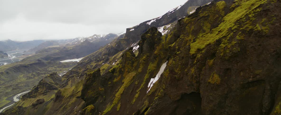 Rocky mountains dusted with moss and snow