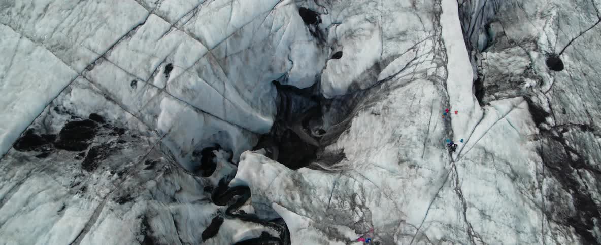 Snow covers a mountain landscape
