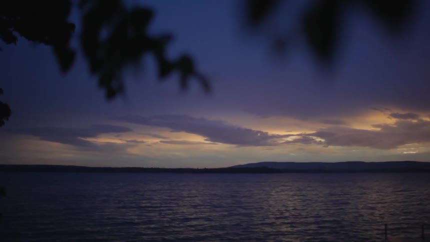Water ripples on a lake at dusk