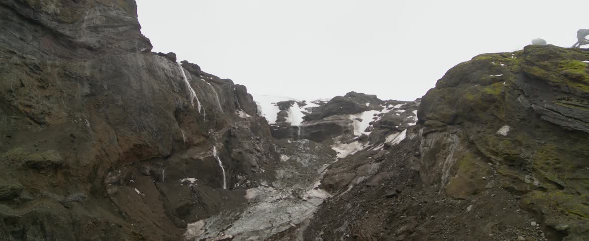 Patches of ice and snow on a rocky slope