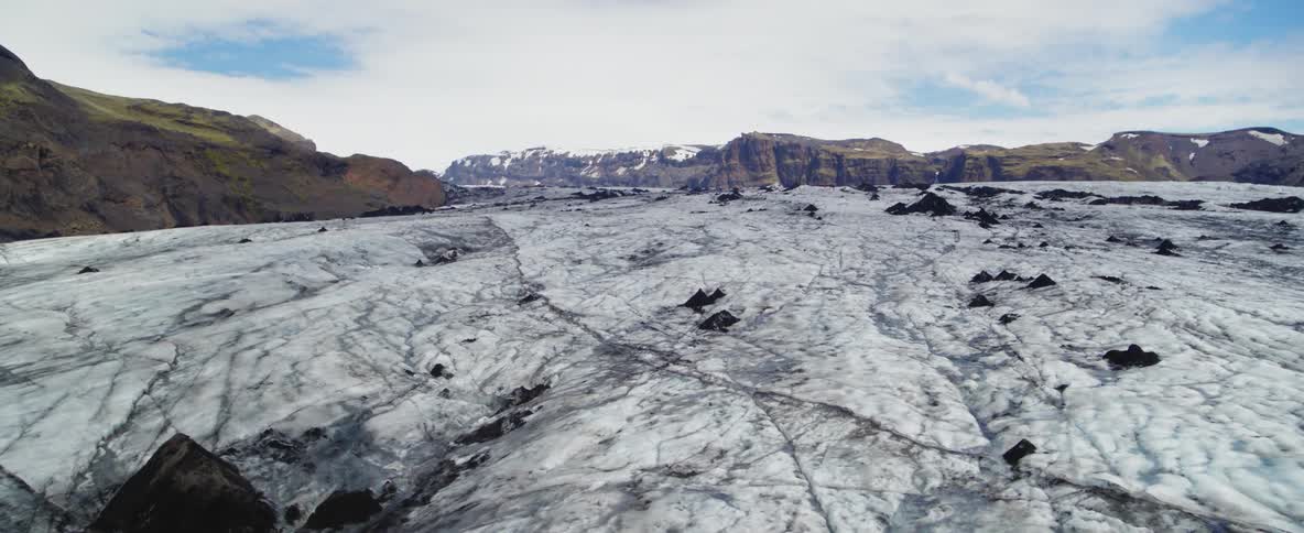 Snow covers a mountain landscape