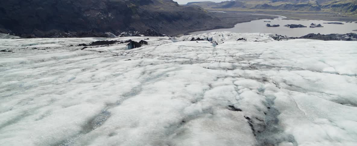 A rocky landscape covered in icy snow