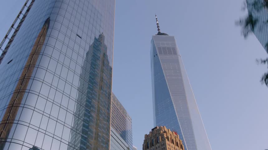 Skyscrapers dominate the skyline of a city on a sunny day