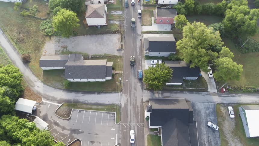 Vehicles commute down the road