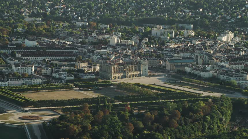 Buildings and trees cover a landscape