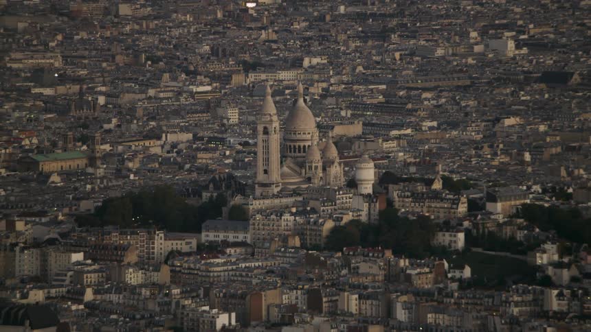 Sacr��-C��ur de Montmartre within the city of Paris after sunset