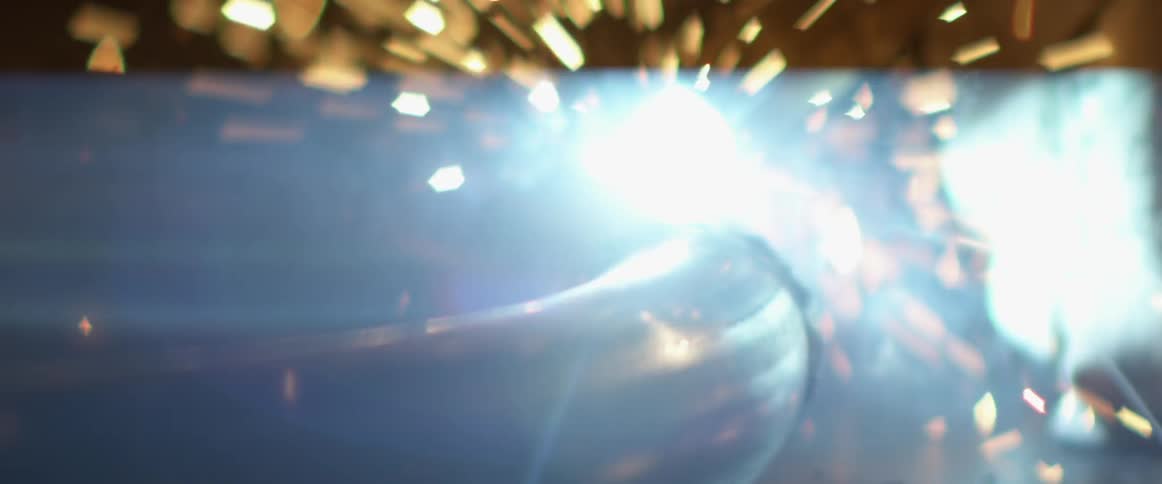 Sparks fly as metal is welded
