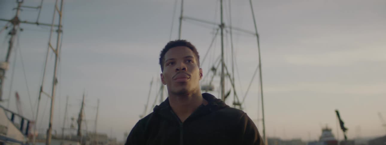 Man disembarks a boat and prepares to jog