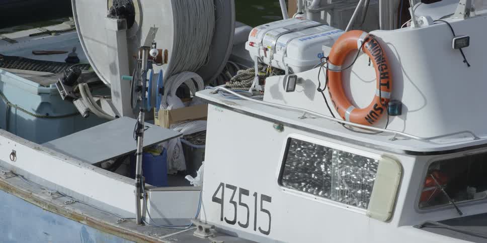 Boat sits at a dock
