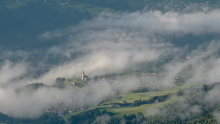 Clouds float over a community