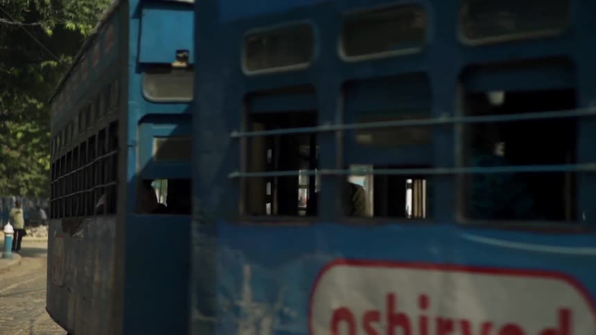 A train passing by a person