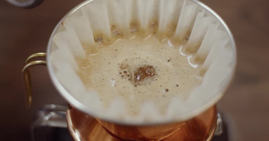 Hot water is poured into a coffee filter