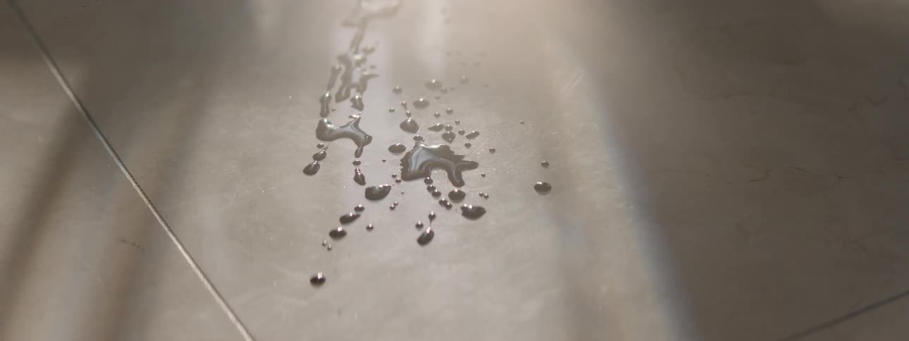 Fighting people cast their shadows on the floor with blood spatter