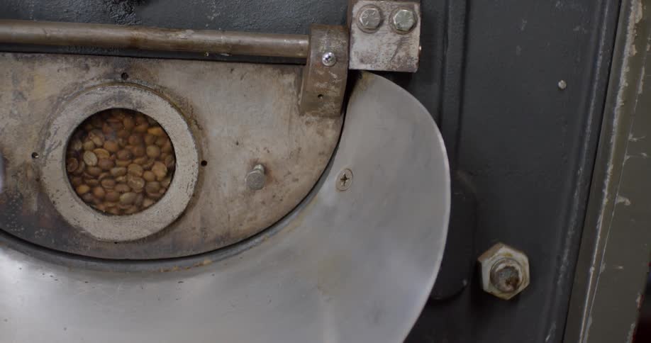 Coffee beans spinning in a machine