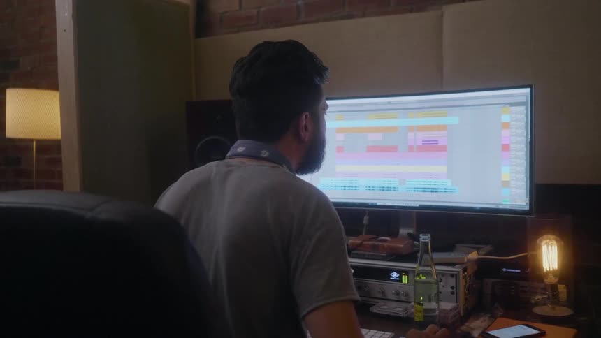 A man works at his computer