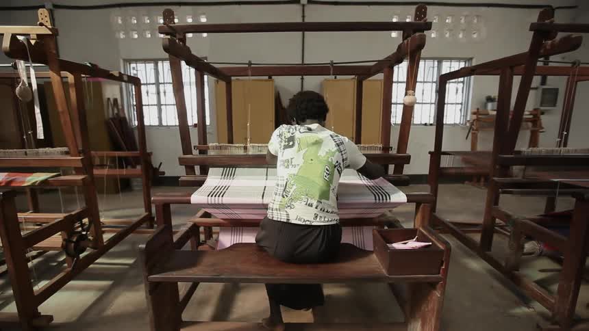 Woman working at a loom