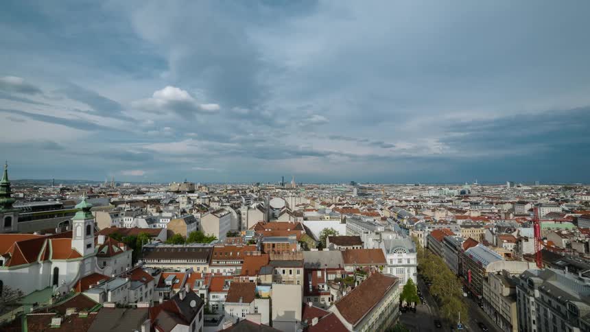 The clouds blow above a city