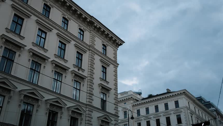 Clouds float over a city building