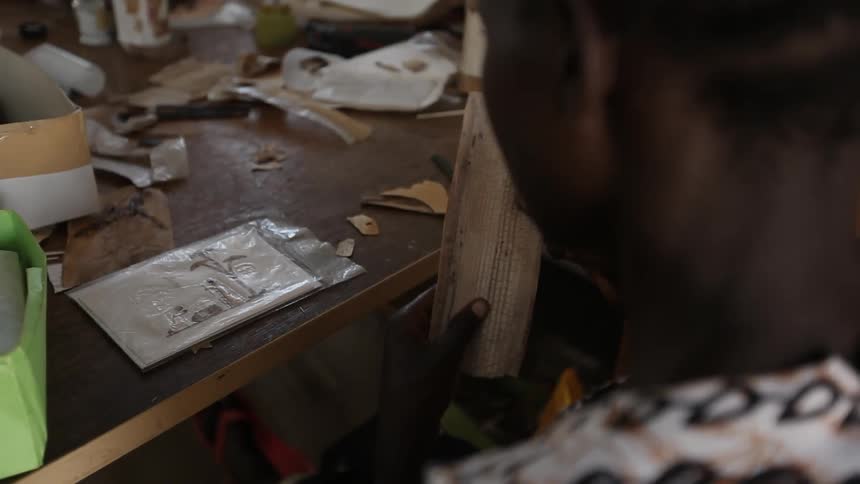 A person cutting paper