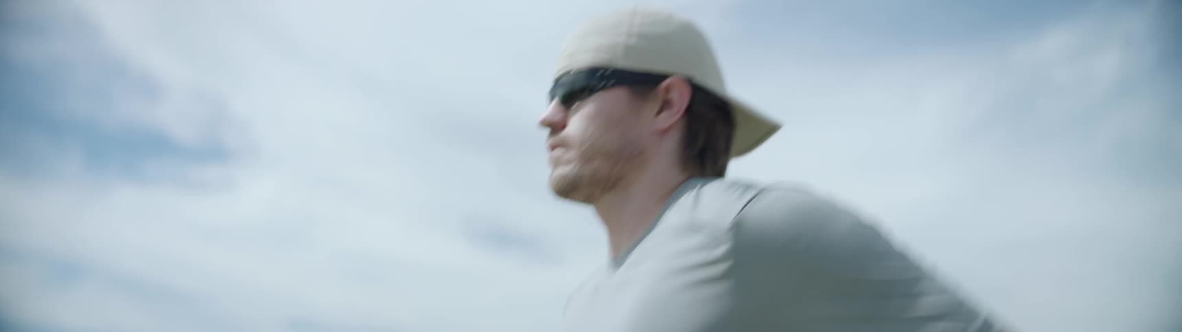 A man jogs through a field