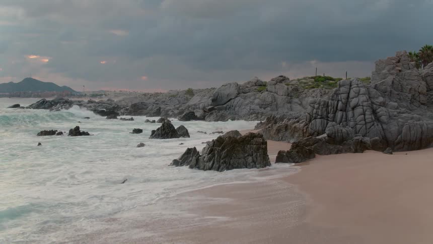 The waves slowly crawl on the shore
