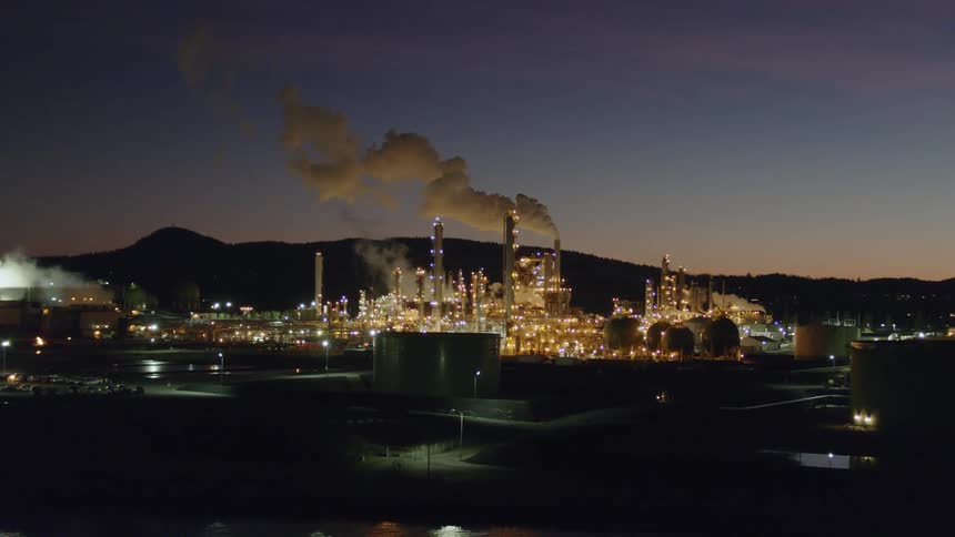 Twilight oil refinery traverse (left to right)