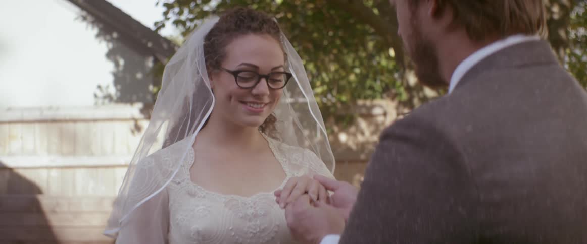 A couple getting married outdoors